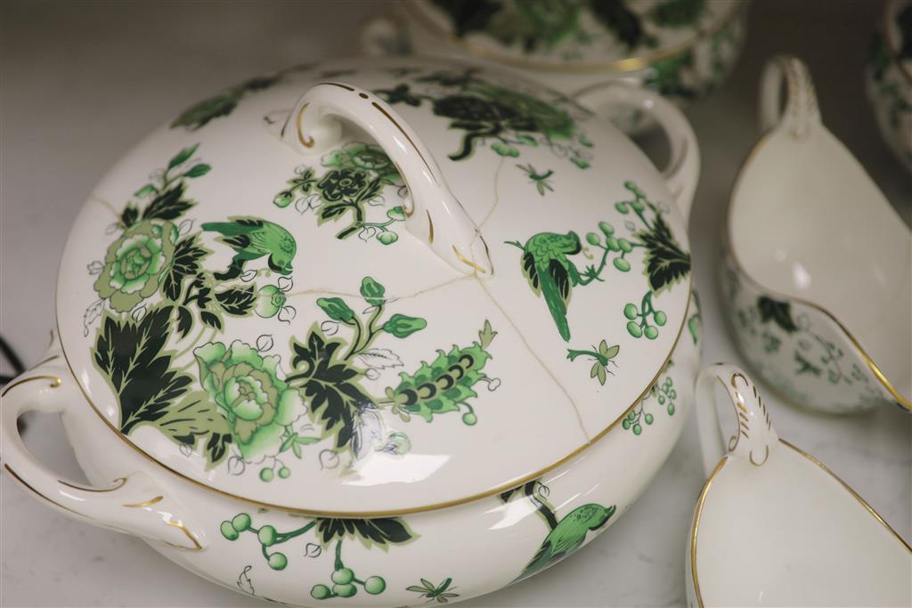 A Coalport Cathay peony pattern green dinner service for twelve settings